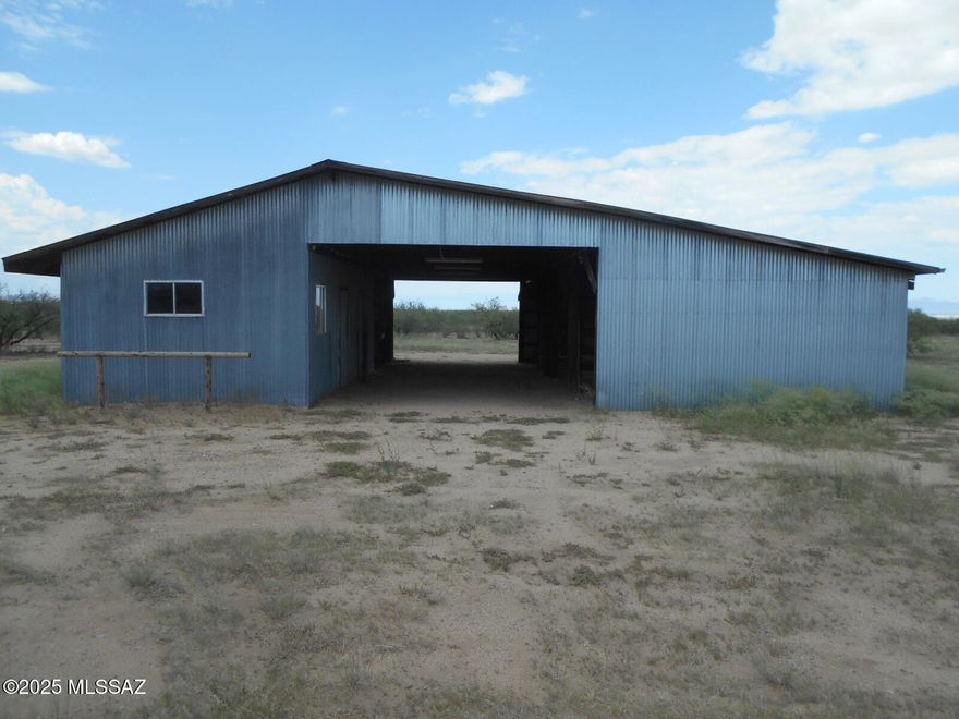 ANOTHER HUGE PRICE REDUCTION!!! Here is a great opportunity for a project! This 5 Acre horse property with beautiful views of the Dragoon Mountains, has an awesome horse barn with multiple stalls, tack room, storage area, and sturdy construction! There's also a loafing shed that can be used for parking, or more covered animal pens. Very well built chain link fencing surrounds the residential area and within that is a great kennel that can be used for your 4-legged friends, or as a really nice poultry pen. The manufactured home needs a ton of work. The Well was recently inspected, and is NOT usable. Fix-up project, or remove the manufactured home and bring in a new one! Lots of options for this horse property in need of TLC.