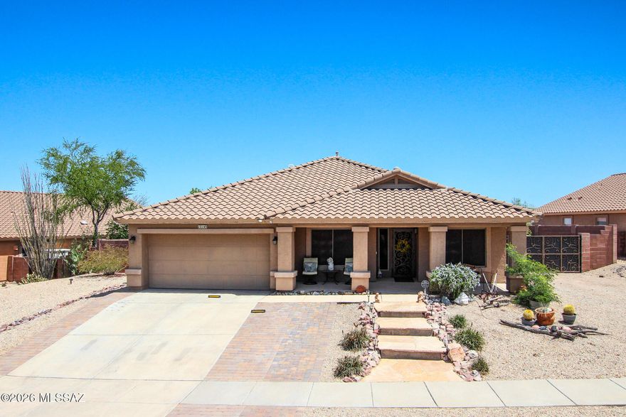 $10,000 PRICE REDUCTION... Beautifully remodeled 4 bed, 2 bath home on a spacious 0.21-acre cul-de-sac lot in the A+ rated Vail School District! Features include a remodeled kitchen, new flooring throughout, updated bathrooms, tankless water heater, solar system, solar screens, reverse osmosis, and soft water system. The backyard is an entertainer's dream with pool & waterfall, hot tub with steps, pergola, outdoor kitchen, expanded brick patio with retaining wall, mountain views, natural preserve/open space behind, and view fencing. Includes shed, drive-through gate, and extended-depth 2-car garage.
Enjoy the perfect blend of comfort, upgrades and outdoor living. This is Arizona living at its finest. Schedule your private showing today to experience it for yourself!