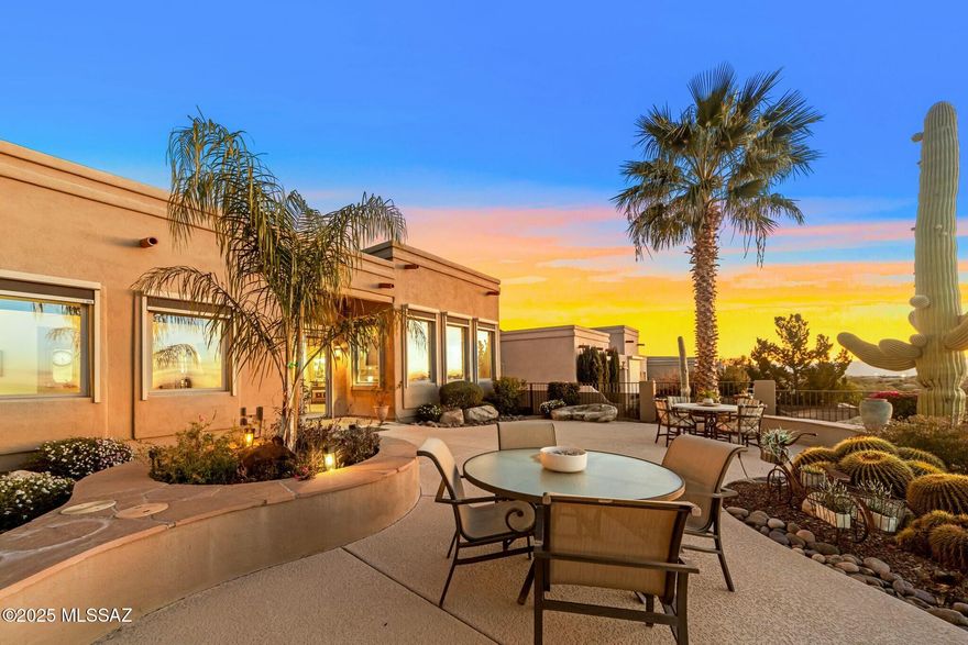 Nestled in a peaceful cul-de-sac within an upscale enclave, this exceptional home offers a perfect blend of luxury, comfort, and breathtaking sunsets. Overlooking the eighth hole of Pusch Ridge Golf Course, it has been elevated w/almost $300K in custom upgrades that seamlessly integrate elegance with its stunning surroundings. Spacious split floor plan features 2-bedrooms, 2-baths, and large office. A masterpiece of design, the gourmet kitchen boasts rich wood ceilings, designer lighting, and Viking SS appliances set against cedar-lined walls. The open-concept living space is equally impressive, where a floor-to-ceiling stone veneer surrounds a 74'' Ignite electric fireplace, perfectly paired with an 80'' flat-screen TV, an ideal setting for relaxation or entertaining! Virtual Tour here! Next step outside into a backyard oasis that will leave you in awe! The elevated patio provides panoramic views of city lights and some of Arizona's best sunsets. This home is a rare opportunity to experience refined living in an extraordinary setting. Words alone cannot capture its beauty you must see it to truly appreciate its splendor.