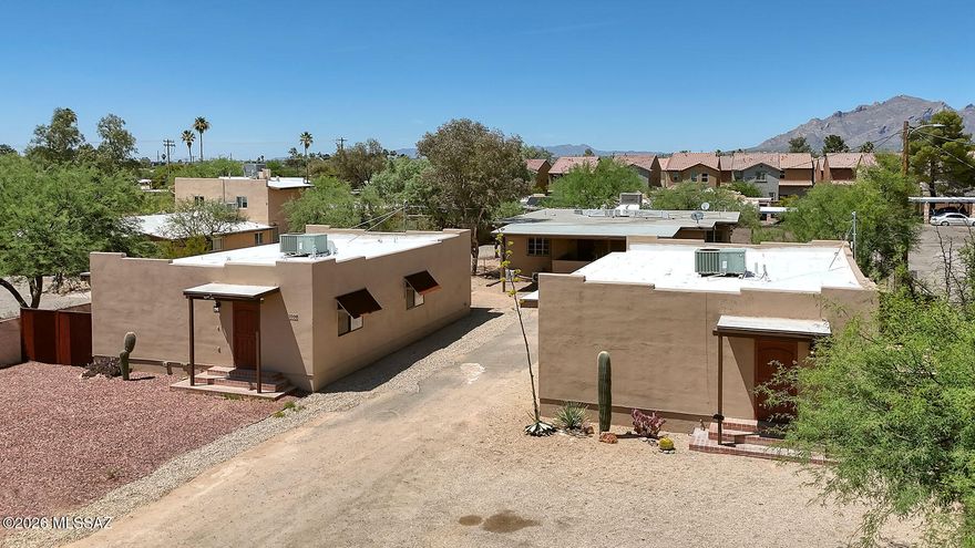 Three Detached buildings-4 Units! 1009, 1011 A/B and 1013 East Halcyon Road! Investor-ready 4-unit multifamily in central Tucson on over 18,000 SF of R-2 zoned land, comprised of three separate tax parcels--offering flexible financing and long-term strategic flexibility. The 4,412 SF property spans three buildings with a desirable unit mix. Two buildings (built 2005) feature 3-bed/2-bath units with scored concrete floors. The rear unit includes a 3-bed/1.5-bath upper unit and a recently remodeled 1-bed/1-bath lower unit. Solid 7% Proforma cap with strong rental demand near the Mountain Ave bike boulevard. Well-positioned for both current income and appreciation.