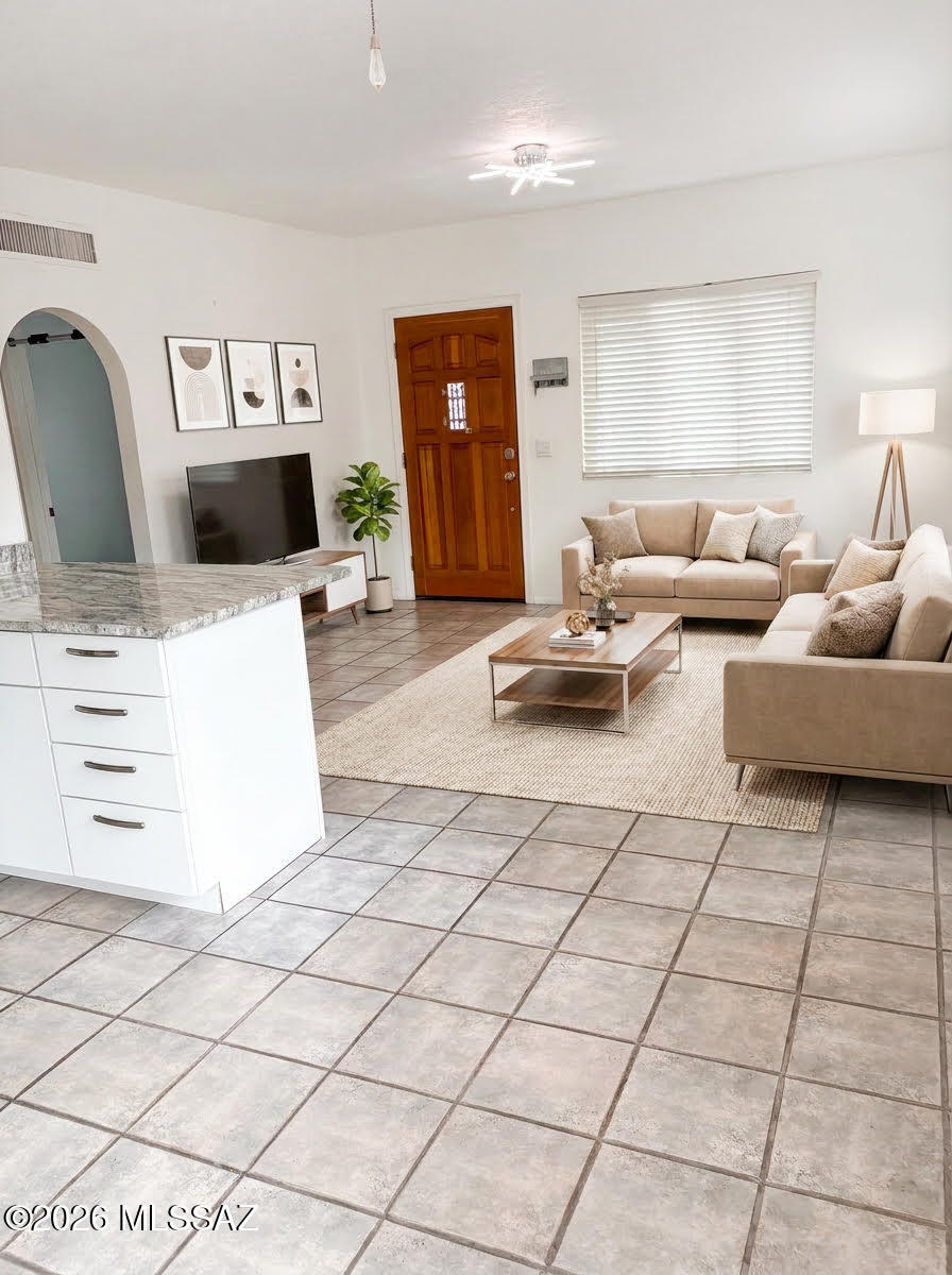 211 W Roger Road 23
