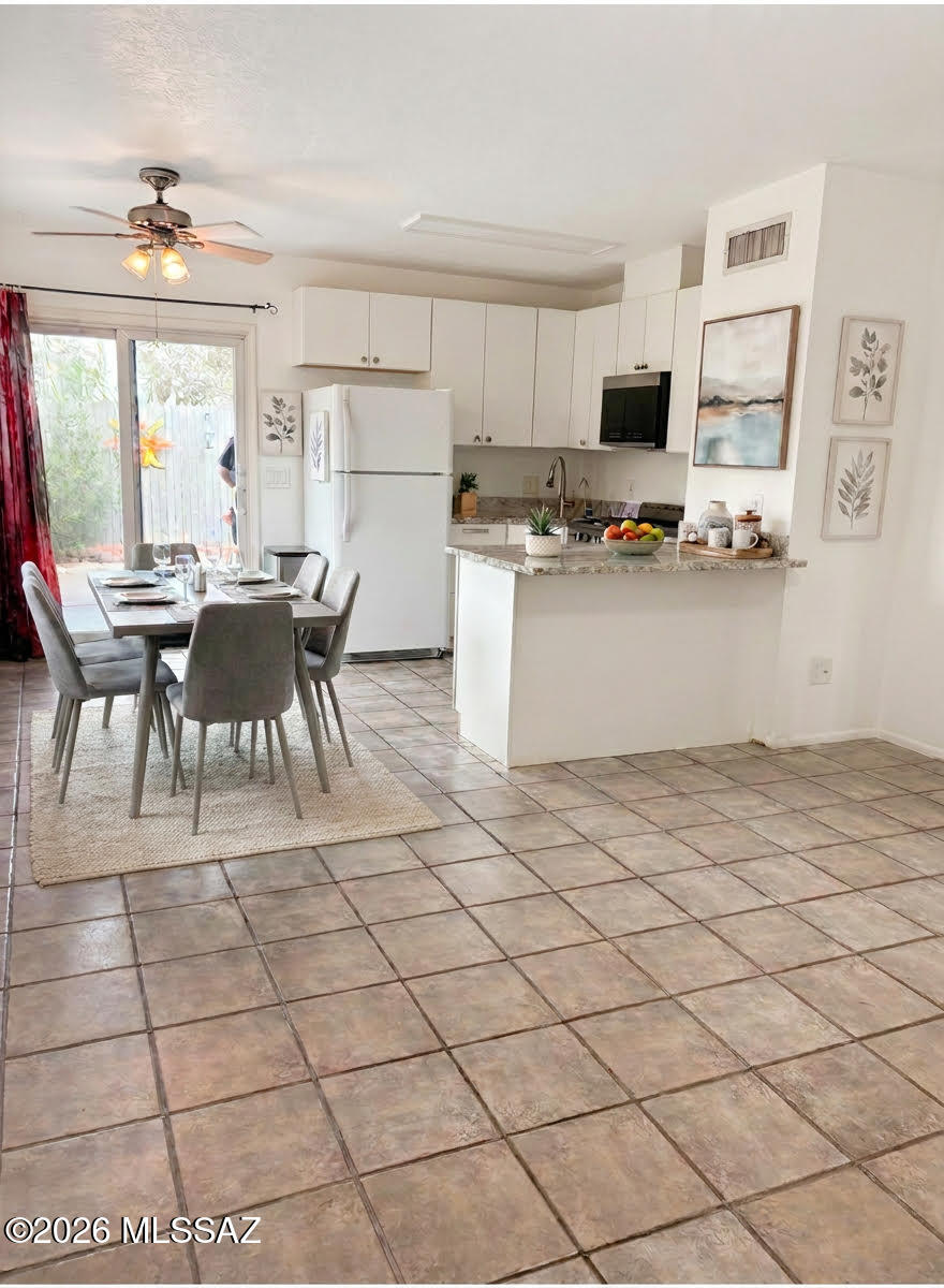 211 W Roger Road 23
