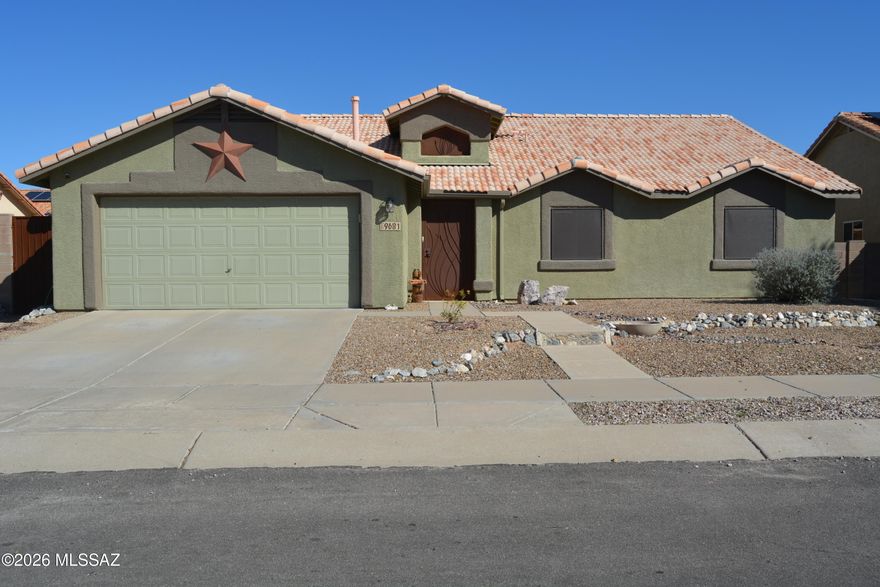 True pride of ownership shines throughout this well-maintained 4-bedroom, 2-bath home offering both comfort and convenience. Updates include windows replaced in September 2021, newer flooring in the main living areas, French doors in great room and living room, & a security door in the foyer for extra peace of mind. The southwest-facing windows feature darker screens along with custom sliding, barn-door-style window coverings for style and light control.

Located in the highly desired Vail School District, this home is just steps from Purple Heart Park, which offers a pool, splash pad, skate park, dog park, and more. Conveniently close to shopping, restaurants, and everyday essentials, the home also features a beautifully landscaped backyard, perfect for relaxing or entertaining.