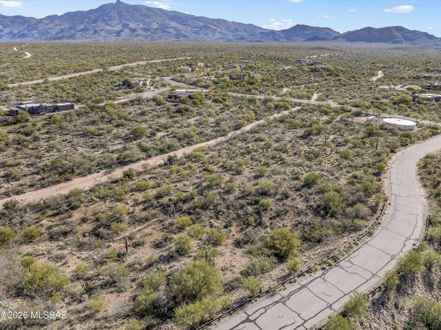 Beautiful 2.63 acre parcel in Vail's Mountain Creek Ranch. Prime custom homesite to build your dream home on this spacious lot with breathtaking mountain views, surrounded by state trust land. Utilities (electric, water, gas) are conveniently available at the lot lineâ”ready for your plans. Enjoy the privacy and natural beauty of Vail's southeast Tucson area. Perfect for those seeking serenity with easy access to I-10, Vail School District, and amenities. Start envisioning your home here!