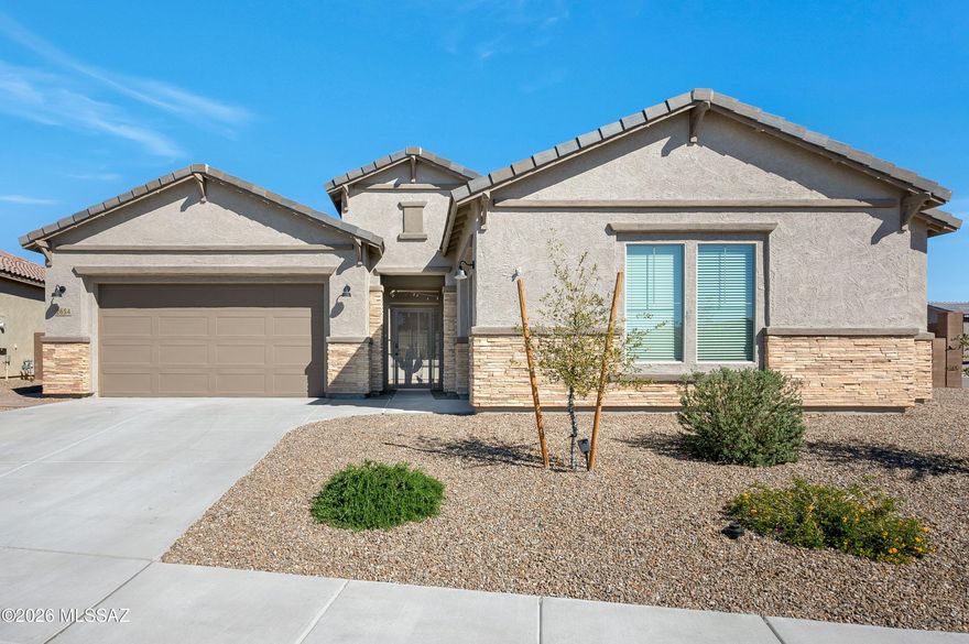 Experience exceptional living in this stunning 3,241 sqft Patagonia Spanish-style masterpiece, nestled on a corner lot within the secure gates of Ironwood Ridge Estates! This single-story Pulte build boasts a split floor plan, perfect for families and entertaining. The main house features a spacious primary suite with a walk-in custom closet, double vanity, and a luxurious shower, plus an ensuite second bedroom. The gourmet kitchen showcases granite countertops, upgraded 42'' upper maple cabinets, and a walk-in pantry. The kitchen flows seamlessly into the dining room and living space. Additional perks include high ceilings, a finished laundry room, and a private courtyard.  ALL-GENERATION GUEST LIVING QUARTERS includes bedroom, restroom, full kitchenette, along with its own laundry room, garage and private entry! The backyard oasis is perfect for entertaining.Enjoy tranquil evenings beneath the pergola, illuminated by the warm glow of a gas fire pit and surrounded by thoughtfully designed landscaping. The above-ground resistance pool provides a unique wellness feature, offering the perfect setting for low-impact cardio and muscle-strengthening through water resistance-all from the comfort of your own backyard.Turn-key and meticulously kept - don't miss out on this incredible opportunity!