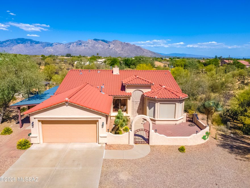 Bring Your Horses, Cars, & Big Dreams! Nestled on 3.37 acres zoned for horses, this distinctive property offers a 2,106 sq. ft. home with the rare combination of comfortable desert living & exceptional hobby space. The thoughtfully designed 2-bedroom plus den, 2-bath residence features high ceilings, custom finishes, ceramic tile throughout, a beehive fireplace, & a beautifully appointed kitchen w/custom cabinetry, granite counters, island, & GE appliances. The spacious owner's suite includes walk-in closet, dual vanities, oversized shower, & bay window w/electric rolling shutter. (More) Outside, the possibilities are endless. Car enthusiasts, collectors, & hobbyists will appreciate the attached garage plus a separate 1,000 sq. ft. insulated & air-conditioned garage as well as another garage/workshop with its own bathroom & 220 service--creating space for up to 10 total vehicles, projects, RV storage, or potential guest-house conversion. Horse owners will love the expansive acreage, water access throughout the property, & room to create the equestrian setup that fits their lifestyle. Additional features include a welcoming courtyard entry, covered patio, decorative bridges and turtle enclosures, catio, & numerous energy-efficient construction upgrades. No HOA! A unique property offering space, flexibility, & freedom rarely found in today's market.