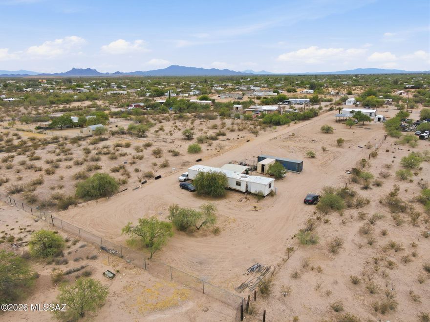 1 ACRE WITH UTILITIES ALREADY IN PLACE -- READY FOR YOUR NEXT HOME.

Located in Marana, just about 20 minutes from the freeway, this 1-acre parcel offers privacy, convenience, and flexibility. Situated toward the back as the dominant parcel, the property includes an easement for access and a gated entry for added security.

Septic tank and water are already on site, saving time and development costs. A manufactured home currently sits on the property and will convey, but the property is being sold for land value only.

Surrounded by other manufactured and site-built homes, this is a great opportunity to place a new manufactured home or build for the future. Enjoy peaceful desert living while still being close to town and amenities.