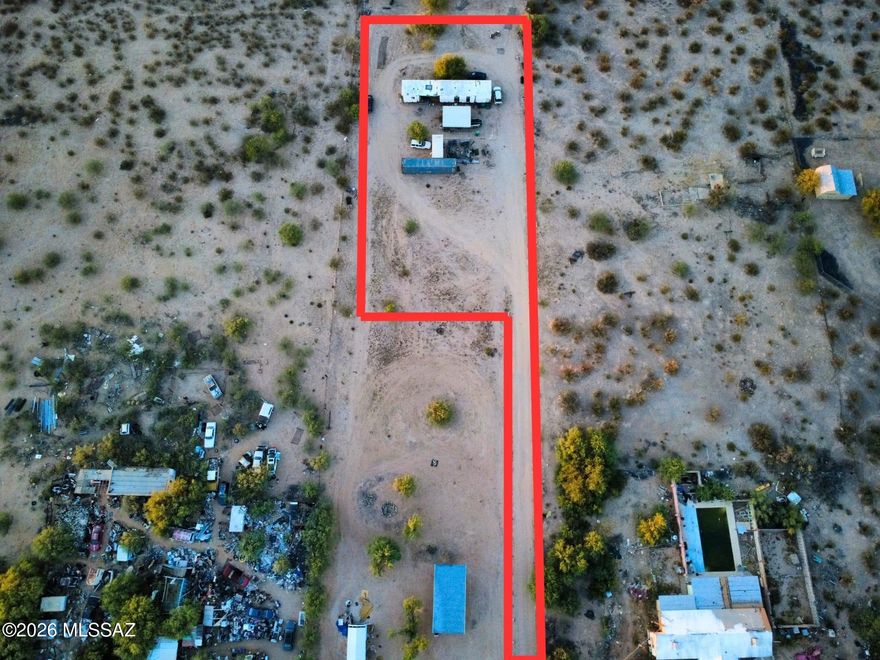 1 ACRE WITH UTILITIES ALREADY IN PLACE -- READY FOR YOUR NEXT HOME.

Located in Marana, just about 20 minutes from the freeway, this 1-acre parcel offers privacy, convenience, and flexibility. Situated toward the back as the dominant parcel, the property includes an easement for access and a gated entry for added security.

Septic tank and water are already on site, saving time and development costs. A manufactured home currently sits on the property and will convey, but the property is being sold for land value only.

Surrounded by other manufactured and site-built homes, this is a great opportunity to place a new manufactured home or build for the future. Enjoy peaceful desert living while still being close to town and amenities.