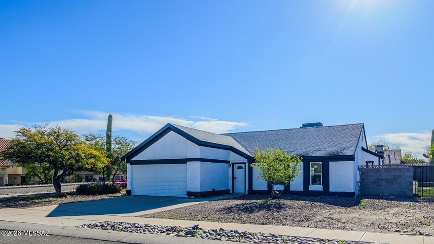 Beautifully remodeled and ideally situated on a prime corner lot, this home is located in the very desirable Tucson community of Saddlewood Ranch and offers 1,955 square feet of thoughtfully designed living space. NO HOA, RV parking, New Roof, Spacious Backyard with covered patio create an ideal setting for year-round enjoyment. The single-level floor plan provides four bedrooms and 3 full bathrooms, including a private primary suite with walk-in closet and ensuite bath, along with multiple living areas ideal for everyday living and entertaining. With recent renovations, functional layout, new roof, this property combines comfort and style. Conveniently minutes away from schools, shopping, dining options, and freeways. Don't miss this opportunity! The interior features both a formal living room and a spacious family room, creating flexible spaces for gatherings, work, or relaxation. The centrally located kitchen opens to the dining area, offering excellent flow and connectivity throughout the home. A fourth bedroom with interior bathroom functions perfectly as a home office or guest space, adding versatility to the layout.