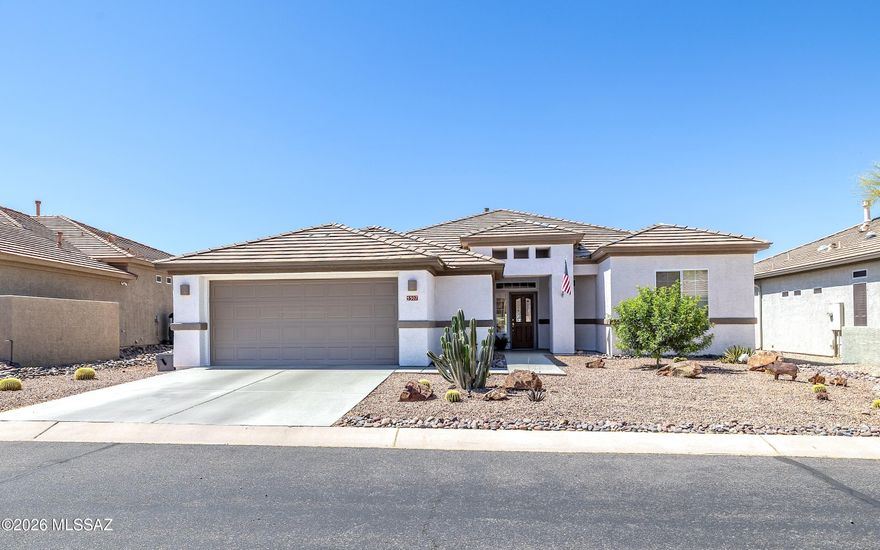 Beautiful, fresh, clean, light & bright Santa Rosa model. All tile flooring - abundant natural light. Wide open flowing floor plan.  Lovely epoxy entry walkway, front porch and back porch. Very extended length and width back porch - one of the most spacious in the subdivision. Built in BBQ station . Backyard fully fenced and has SW Marana city lights looking to the right.  Garage has a spacious golf cart bump out alcove.  Large bonus craft or office room w/abundant cabinetry - desk stations.  Water heater replaced roughly 4 years ago - HVAC changed out @ 2017. Home is very crisp and move-in-ready.   Come view the fresh clean natural light that glows throughout this beautiful home.