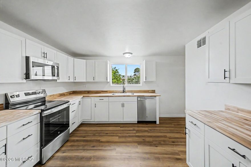 List Range Pricing, Seller will accept or counter offers between $274,700 - $284,700 *** Beautifully updated 3-bedroom, 2-bath home featuring modern finishes and thoughtful upgrades throughout. Enjoy peace of mind with a brand-new roof and stylish new flooring that flows seamlessly through the home. The kitchen is a standout with crisp white shaker cabinets, warm butcher block countertops, and stainless steel appliances--perfect for both everyday living and entertaining. A desirable split floorplan offers added privacy, while abundant storage provides functionality and convenience. This move-in-ready home combines comfort, style, and value with so much more to offer.