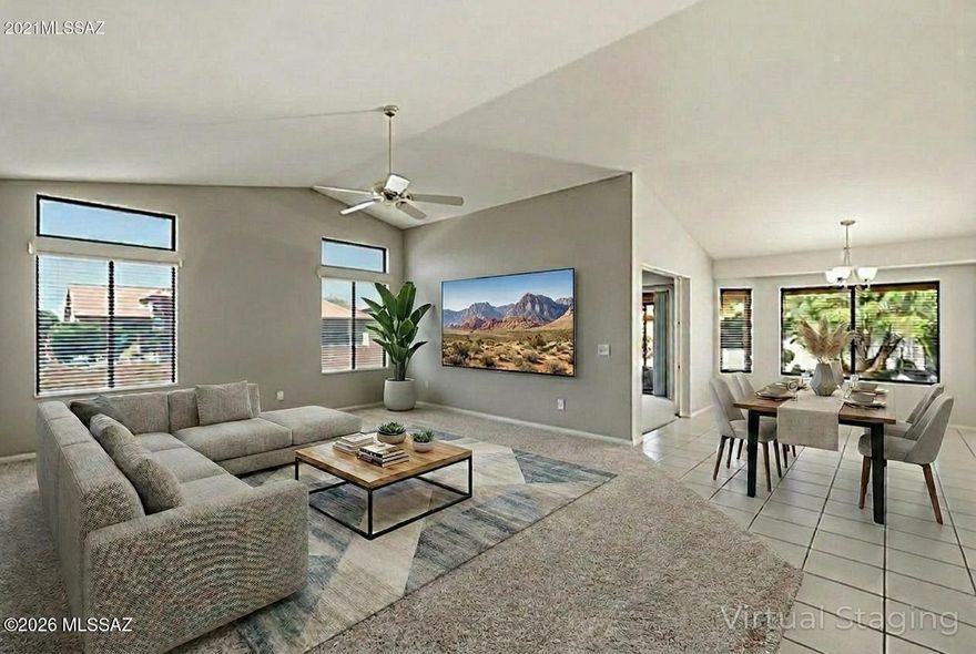 Located in SaddleBrooke Two Active Adult Community, this expanded Sonora floorplan offers versatile living with an extra bonus den and flexible great room and 2 bedrooms. The updated kitchen features granite countertops and stainless appliances, additional portable prep island - perfect for everyday living and entertaining. Situated on a large corner lot, the private backyard includes a ramada for added sun protection and relaxing outdoor enjoyment. Front patio enjoys mountain views. The guest room showcases front mountain views, while the primary suite offers a bay window sitting area and walk-in closet. Both bedrooms have new carpet (2/2026). Two-car garage with storage cabinets. HVAC 2014. Original owner moved to be near family. SELLER will pay $5505 Cap Imp Fee  with acceptable offer!