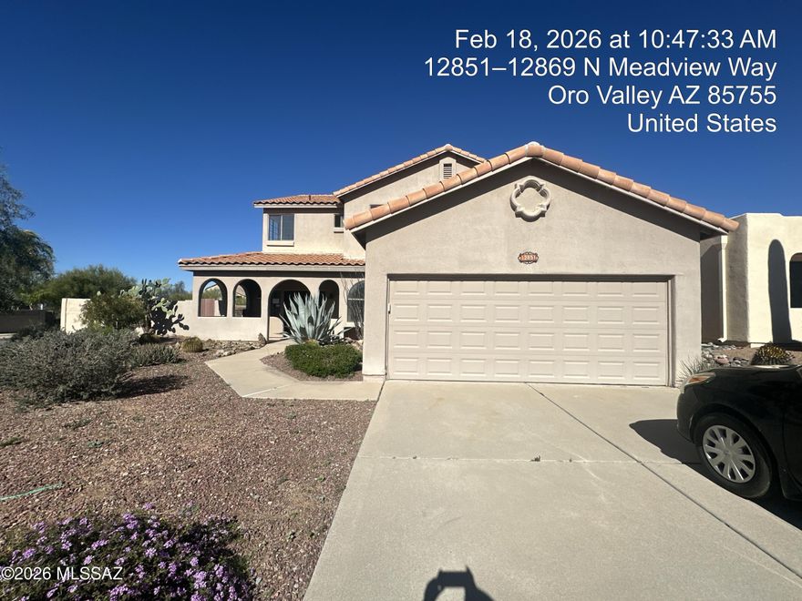Two story home with a finished basement and private swimming pool.