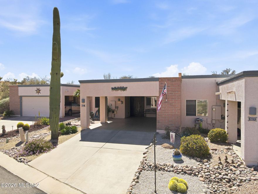 Welcome to your next happy place in sunny Green Valley! This charming two-bedroom, two-bathroom townhouse has been lovingly updated from top to bottom, making it the perfect spot for year-round living or your seasonal escape from the cold.

Step inside through the wrought iron security door into a welcoming foyer that sets the tone for what's ahead. The kitchen is a real showstopper with gorgeous quartz countertops, under-counter lighting, recessed lights, a new drop-in sink and faucet, brand new stainless steel appliances, a garbage disposal, and a handy island with a breakfast nook featuring plantation shutters. It's the kind of kitchen that makes you actually want to cook dinner.

The living room flows right off the kitchen with beautiful new plank flooring and skylights that fill space with natural light. Fresh paint and new outlets and baseboards throughout the entire home give everything that crisp, move-in-ready feel.

Both bedrooms feature new carpet, ceiling fans, and plantation shutters. The primary bedroom includes a walk-in tiled shower in its en-suite bathroom, while the guest bedroom offers a lovely mountain view and a bathroom with a tub and shower combo. New toilets in both bathrooms round out the updates.

Step outside to the covered patio and enjoy the soothing sounds of a private fountain in your backyard. Out front, you'll find a double carport with epoxy flooring, electrical outlets, and a cozy sitting area where you can soak in those stunning mountain views. There's also convenient storage in both the front and back.

Nearby, you'll find Canoa Hills Trails Park for morning walks and Safeway for easy grocery runs.

This townhouse radiates a warm, homey feeling that you simply have to experience for yourself. Schedule your showing today!