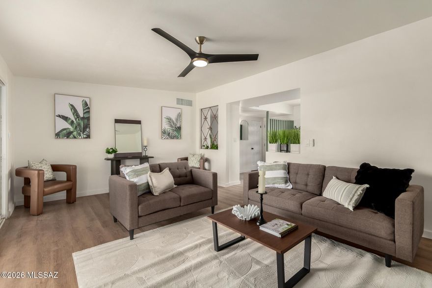 Seller will consider offers between $379,900- $369,900 depending on terms and concessions, with up to $10,000 in buyer concessions available. This expertly renovated 4-bedroom home features a circular driveway, an attached carport, and an inviting front patio. Discover an upgraded interior showcasing a serene living room with a soothing palette, stylish wood-look flooring, and a cozy fireplace. The updated kitchen comes with quartz counters, soft cream cabinetry, and sleek stainless steel appliances for a delightful cooking experience. The cozy primary bedroom includes soft carpeting and a private bathroom for added comfort. Brand New HVAC, water heater, and roof. Pool was just refinished. Brand New HVAC, water heater, and roof. Pool was just refinished.