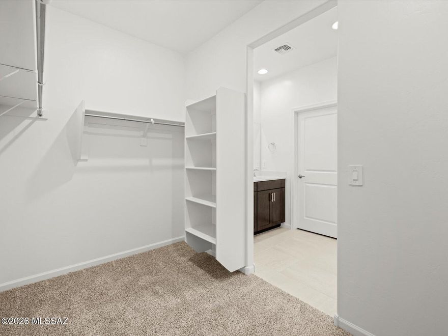 Brand new, energy-efficient home available by Feb 2026! The teen room makes the perfect additional living area for homework, TV or gaming. Enjoy dual sinks and a walk-in closet in the primary suite. Located less than 10 minutes from I-10, it offers convenient access to employment centers and downtown Tucson. This community features several amenities such as bike and walking trails and playgrounds. Move-in ready with a washer, dryer, fridge, and whole-home blinds; closing in 60 days or less - guaranteed. Each of our homes is built with innovative, energy-efficient features designed to help you enjoy more savings, better health, real comfort and peace of mind
