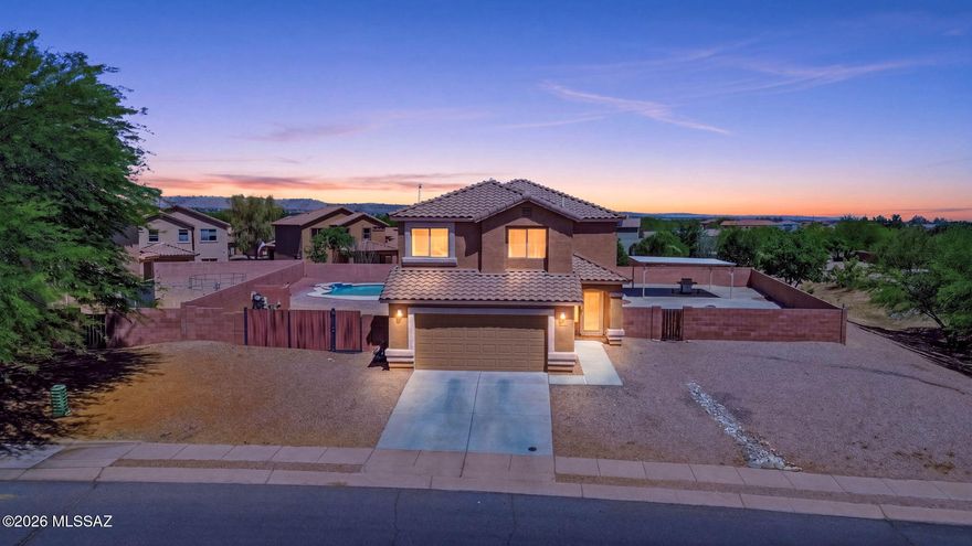 Seller will accept and/or counter offers between $399,997 & $411,997. Freshly painted inside & out, this 4-bedroom, 2.5-bath home features fully owned solar, an EV charger, & a 2-car garage. All four bedrooms are conveniently located upstairs, creating a functional layout w/ ample living & entertaining space on the main level, along w/ a convenient downstairs powder room for guests. Situated on a .34-acre lot-one of the largest in the neighborhood-the backyard is built for entertaining w/ a sparkling pool, covered Ramada, spacious yard, & double gate access. Community amenities include a pool, walking paths, parks, playgrounds, & sports courts. Conveniently located in Sahuarita near I-19, shopping, dining, schools, & everyday conveniences. Move-in ready and ready for Summer Fun!