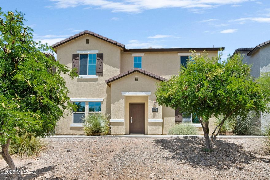 Welcome to the highly sought-after Sierra Morado community on Tucson's rapidly growing East Side, where comfort, versatility, energy efficiency, and convenience all come together in one beautifully maintained home. Thoughtfully designed with flexible living spaces and an ideal layout for today's modern lifestyle, this spacious residence offers incredible potential and is ready to welcome its next proud owner. From the moment you arrive, you'll immediately appreciate the inviting curb appeal, well-kept surroundings, and prime location just steps from one of the community's beautifully maintained parks and common areas.

Step through the front door and be greeted by an expansive living room filled with natural light from oversized windows that overlook the side patio. This outdoor space has been tastefully upgraded with elegant pavers and low-maintenance hardscape, creating the perfect setting for outdoor dining, relaxing evenings, entertaining guests, or simply enjoying Tucson's beautiful weather year-round. The seamless indoor-outdoor flow enhances the overall functionality and charm of the home.

Inside, the spacious floor plan offers exceptional flexibility for a variety of living arrangements. A downstairs office or den space can easily function as a fifth bedroom, guest quarters, hobby room, or private area for multigenerational living, making this property an outstanding option for growing households or anyone seeking additional space. The home has been professionally cleaned and meticulously cared for, allowing buyers to move in with confidence and immediate peace of mind.

The generously sized kitchen serves as the heart of the home and provides an abundance of cabinetry and storage space, ideal for those who love to cook, entertain, or simply enjoy an organized lifestyle. The oversized pantry and massive downstairs storage closet provide incredible functionality and plenty of room for seasonal decorations, household essentials, and more. Whether preparing meals for family gatherings or enjoying quiet mornings at home, this kitchen was designed with both convenience and practicality in mind.

As you make your way upstairs, you'll discover an additional loft-style living area that adds yet another layer of versatility to the home. This flexible bonus space can easily be transformed into a media room, playroom, home office, fitness area, study space, or secondary family room--perfect for accommodating a wide variety of needs and lifestyles. The expansive primary suite offers a peaceful retreat with generous proportions, a spacious walk-in closet, and an en-suite bathroom complete with dual vanity sinks and plenty of room to unwind after a long day.

Three additional upstairs guest bedrooms provide ample accommodations for family members, guests, or workspace needs, while the upstairs full bathroom with a shower and tub combination offers both functionality and convenience. A downstairs powder room further enhances the thoughtful layout and accessibility of the home.

One of the standout features of this exceptional property is the fully owned solar system, offering tremendous energy efficiency and helping reduce monthly utility costs--an increasingly valuable feature for Arizona homeowners. Combined with the home's well-maintained condition and functional design, this creates an outstanding opportunity for buyers looking for long-term value and comfort.

Location is everything, and this home truly delivers. Ideally situated within walking distance to the highly regarded Civano K-8 Community School and conveniently located near the brand-new Tucson Medical Center Rincon Hospital, this property offers outstanding accessibility to some of the East Side's most desirable amenities. Enjoy quick access to shopping, dining, parks, medical facilities, and top-rated schools, all while benefiting from the continued growth and strong demand surrounding Tucson's East Side communities.

With its flexible floor plan, abundant storage, energy-efficient features, multiple living spaces, professionally designed outdoor areas, and unbeatable location within Sierra Morado, this move-in-ready home offers a rare combination of value, comfort, and opportunity. Whether you're searching for room to grow, space to entertain, or simply a beautifully maintained property in one of Tucson's most desirable neighborhoods, this home checks all the boxes.

Don't miss your opportunity to experience everything this incredible property has to offer--schedule your private showing today and discover why Sierra Morado continues to be one of Tucson's most sought-after communities.