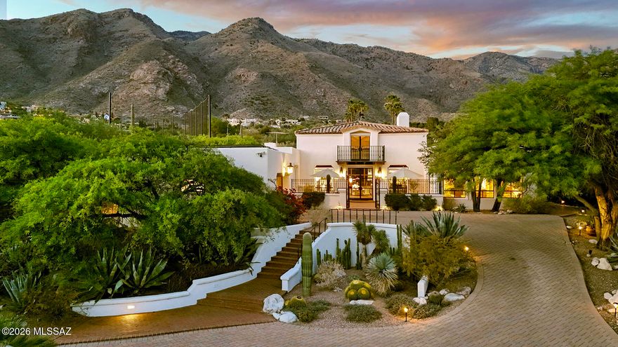 Timeless Elegance & Beauty captured in this one-of-a-kind Spanish Colonial Masterpiece, remodeled & updated in the highest quality, craftsmanship and design.  Rich Architectural Features include Cathedral Ceilings, Wall-to-Wall Brick Floors, Hand-carved Doors, Scalloped Arches, Floor-to-Ceiling Windows, 4 Masonry Fireplaces, Wrought Iron Fixtures, Mezzanine Library w/Balcony.  Deep Setback, Majestic Front Elevation, Gated Driveway & Courtyard w/ Multiple Patios and Meandering Walkways through Pristine Desert Landscape.  1st Class Kitchen Remodel by ''Affinity Kitchen'' includes Wolf Gas Cooktop, Convection & Steam Ovens, SubZero Refrigerator and Paykel Fisher DW.  It's  Gourmet & Gorgeous!  Open Floor Plan Scaled for Entertaining w/ Separate Bedroom Wings and 3 Beautiful Bathrooms. A home worthy of "Architectural Digest" sited on over an Acre, with Unobstructed Catalina Mountain Views.  Lovingly Maintained, Loaded with Upgrades, including Solar.  You'll love living in Guard Gated Skyline Country Club, where you'll experience some of the most spectacular scenery of any Golf Course Community in the entire southwest.  Close to Everything yet Away from it All!  An Opulent Opportunity to own an Architectural Jewel, Reminiscent of our Cherished Tucson Legacy, the "Arizona Inn."