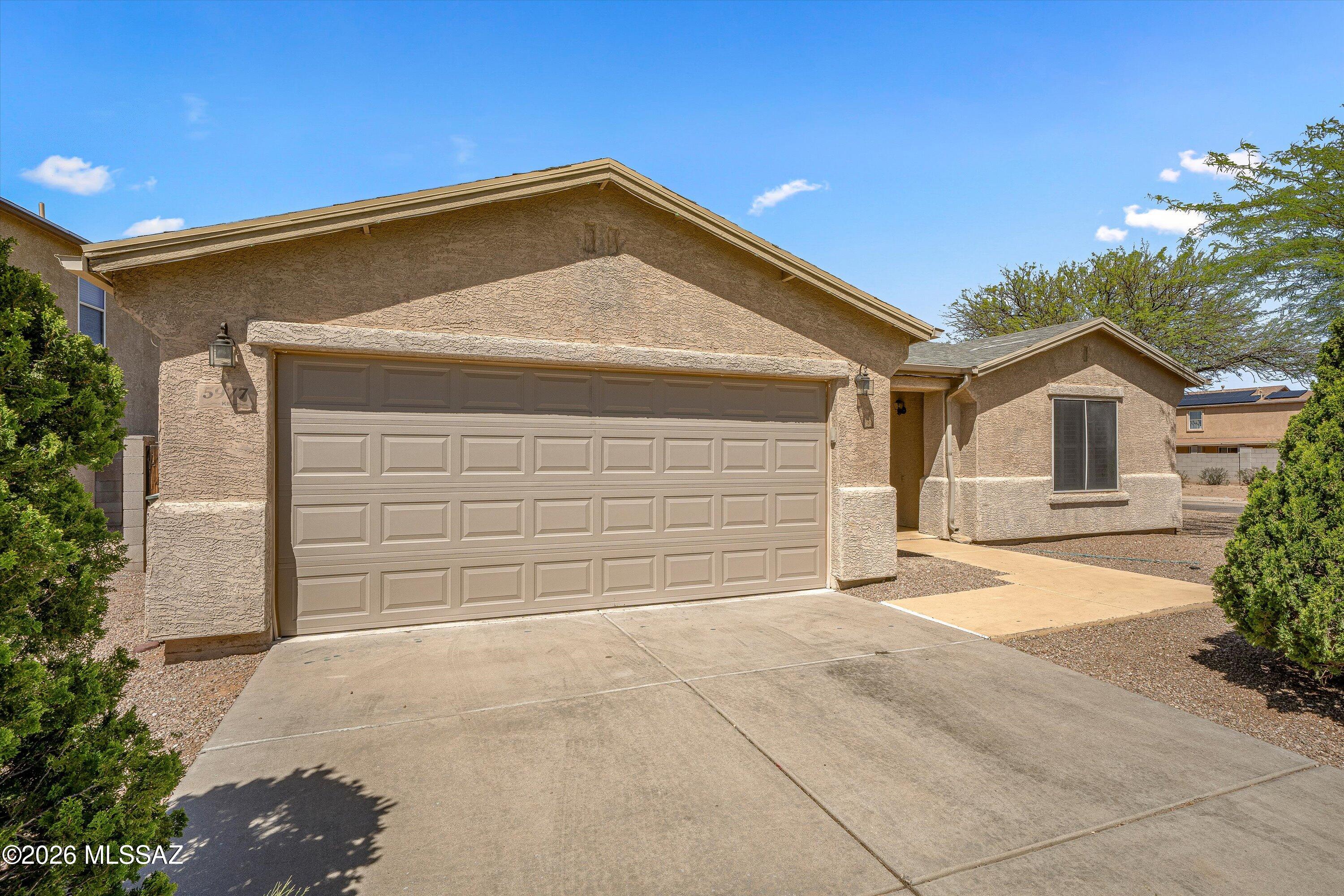 5977 E Cedarbird Drive