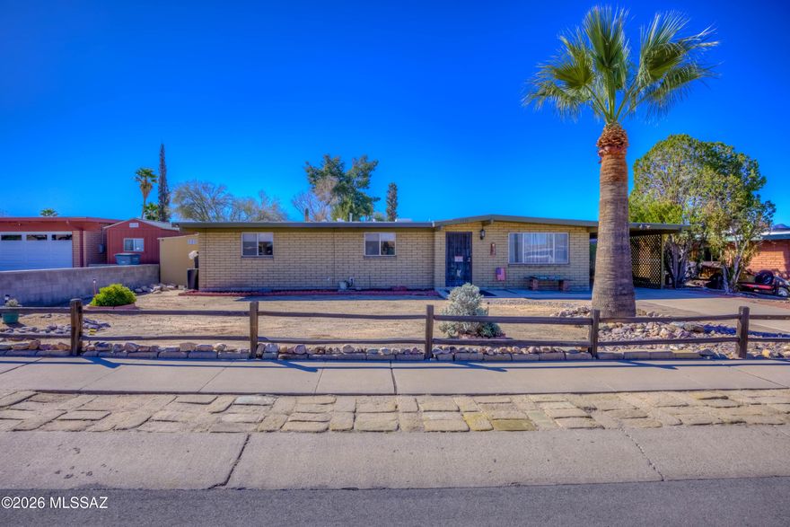Delightful home and move in ready. Great floor plan with two living areas. Newer HVAC, new flooring in main living areas, and large backyard. Very large laundry room and pantry/storeroom. Full hall bath, with skylight. Mature vegetation in front and back.