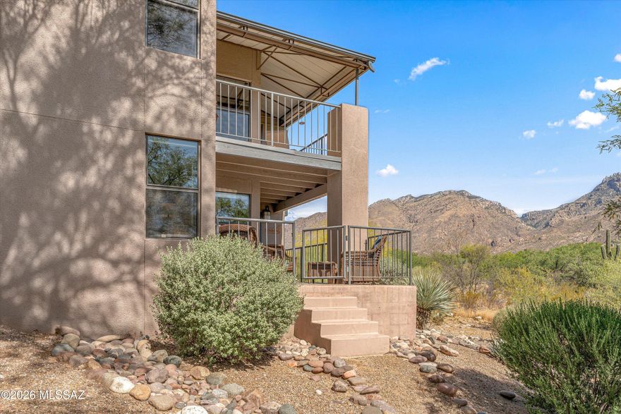 Enjoy breathtaking mountain views from this stunning, reimagined 3 bedroom end unit, split-plan, first-level condo in prestigious Ventana Canyon Area. Backing to open desert for ultimate privacy, this quiet sanctuary features an extended covered patio perfect for taking in the scenery. Fully furnished and turnkey, the redesigned floor plan offers seamless flow with high-end finishes: wood-look tile flooring, SS appliances, and Silestone countertops. Both baths are upgraded with custom walk-in tiled showers and glass enclosures. Steps from the community center, BBQ, firepit, pool, and spa, and minutes from Sabino Canyon's world-class hiking and many local conveniences. Whether a premier vacation rental or primary residence, this home is a desert gem. Just bring your toothbrush!