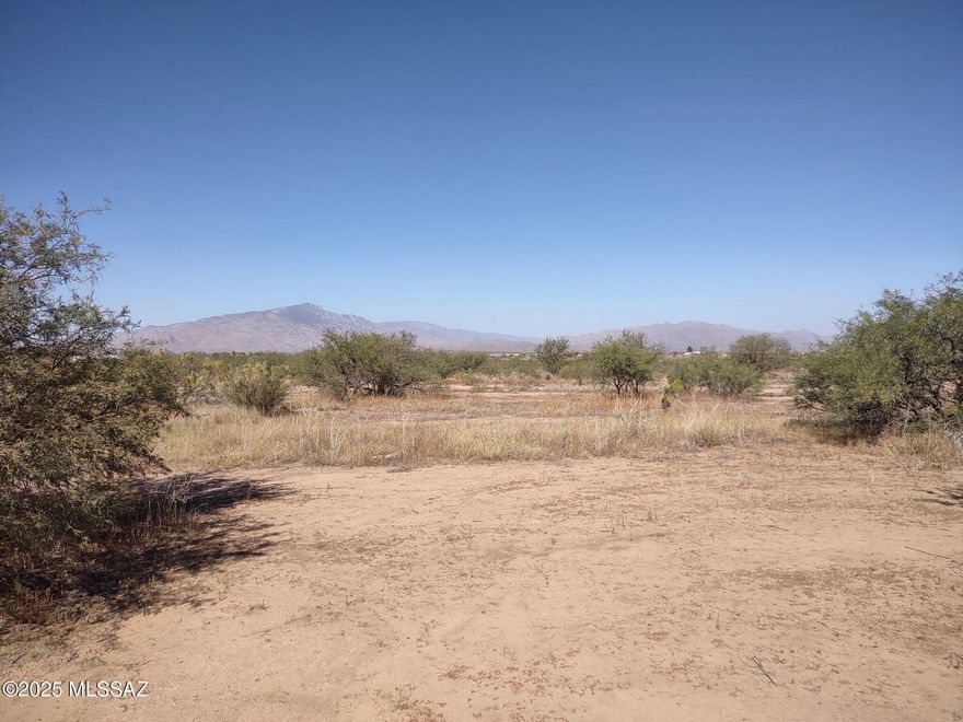 Recently surveyed 4 acre lot available in Mescal area ready for your forever home. Utilities available at the lot line including water from private water company. Lot offers beautiful views and privacy but easy access to i0 for shopping and other services. Relatively flat parcel for building site and mature mesquite trees for privacy. All corners are staked with red survey flags and this parcel can be accessed from paved Cherokee Trail. Buyer to do all due diligence regarding utilities. Parcel was recently split, taxes reflected are  on lot before split and will have its own parcel number and legal description at closing.