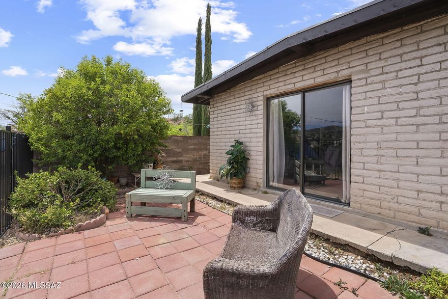 A wonderful and well maintained 4 bedroom, 2 bathroom ranch style, family home with beautiful mountain views. Solidly built on a hill, this property has a retreat like feel and offers privacy, quietude, and a peaceful atmosphere.The home has a great floor plan with an open kitchen and living room area that is sure to make any cook happy. Some of the recent improvements include lighting upgrades throughout, new shower and sink countertop in master bathroom, new double vanity and countertop in the guest bathroom, a newly enclosed fenced front yard, and a bonus room in back!  The home is a short 3 minute walk to a lovely park with grass, a shaded playground, splash pad, Little League baseball field, and a basketball and pickleball court. Come experience this hidden gem and make it your home.