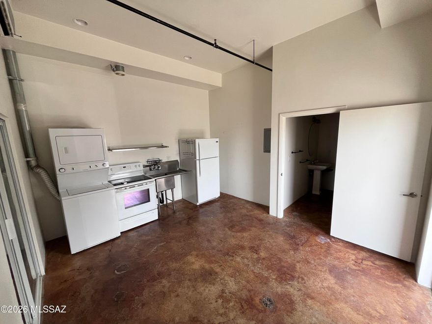 This modern industrial property is designed for living, working, and entertaining. Features include beautiful concrete floors, soaring ceilings, and stainless steel appliances, including washer & dryer. The open studio layout offers flexible space for living, sleeping, and a home office or creative setup.

Enjoy the gated community which features indoor and outdoor common areas! Indoor area has a pool table and original art, adding to the unique, creative vibe of the community. Outdoor area with plenty of seating and parking. This is a one-of-a-kind space with endless possibilities in a prime location close to downtown, the U of A, and freeway access.

1 year Lease
Tenant pays electric, gas and flat $40 monthly water/sewer/trash charge
Assigned parking
Gated community Pets Negotiable
No Smoking inside unit

Call (520) 328-8220 or fill out guest card through website at jmdamanagement.com to set up a tour! Equal Housing Opportunity.