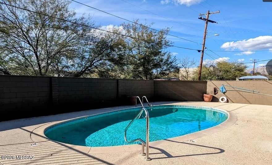 Charming 2BR/1BA end-unit condo located in the desirable Catalina Vista/Oak Flower area, just minutes from the University of Arizona and Tucson's world-famous Loop River Path for walking and biking. Brand-new carpet, and a private yard perfect for morning coffee or enjoying Tucson's golden evenings. The community is known for its responsive and efficient HOA management and offers convenient access to nearby amenities including Trader Joe's, shopping, transit options, and a YMCA Family facility just a short walk away. Residents also enjoy access to a sparkling community pool for relaxing weekends. Washer/Dryer Inclued.  Rent: $1,175/month + $75/month for water, sewer, trash, and covered parking. Resident pays electric. Pet friendly.