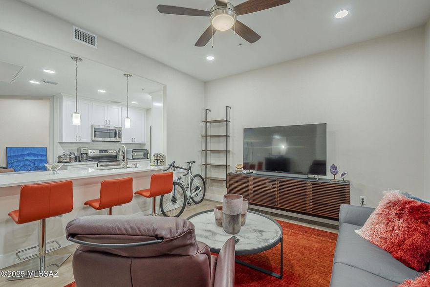 Discover comfort and convenience in this charming 1-bedroom, 1-bath condo with a den, perfectly situated at the sought-after corner of River and Campbell! The home offers direct Riverwalk access and walkability to top-tier dining, boutique shopping, and vibrant local businesses. This cozy yet stylish unit features smooth vinyl flooring throughout and a modern kitchen complete with white shaker cabinets, stone countertops, and a welcoming breakfast bar--ideal for casual meals or entertaining. With thoughtfully selected designer finishes, this is an unbeatable opportunity to own in one of the city's most desirable locations!