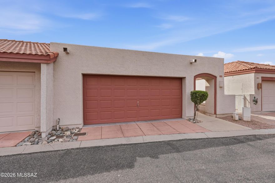 Nestled within the highly sought-after Omni Tucson National community, this charming townhome offers the perfect blend of comfort, convenience, and desert lifestyle living. Located at Omni Tucson National, this well-maintained residence features approximately 1,140 square feet of living space with 2 bathrooms, 2 car garage, and low-maintenance living in a beautifully established golf course setting. Enjoy peaceful surroundings, mature landscaping, and easy access to nearby shopping, dining, and outdoor recreation. Whether you're looking for a full-time residence, seasonal retreat, or investment opportunity, this home provides an exceptional opportunity to live in one of Northwest Tucson's most desirable communities near golf, resort amenities, and stunning views.