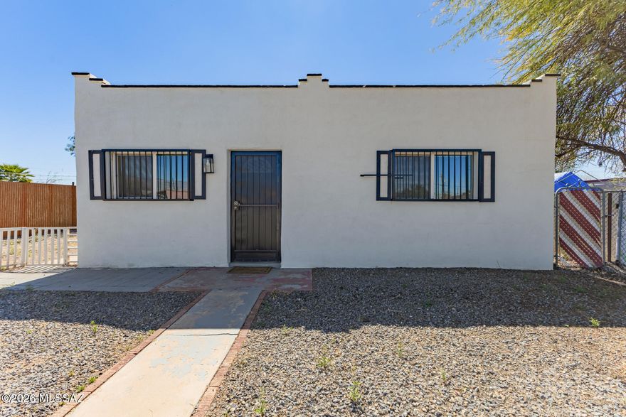Unlock the possibilities in this charming 2 bed, 1 bath Tucson home! Featuring a beautifully updated kitchen, this property is full of potential. The highlight is a separate, unfinished structure on the property which is a blank canvas ready to be transformed into your dream guest house or workshop. Live in the main house while you build equity by finishing the bonus space. This is a fantastic opportunity for a savvy buyer looking to create their perfect space. Don't miss out on this unique property with endless potential