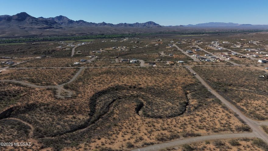 17.40 Acres, 2 total lots, sold together in, in Rio Rico's fastest growing area. Zoned B1 for the small businesses to move in. You can live and work from home with this zoning. See attached Santa Cruz county zoning code for all of the many options, including neighborhood market, bakery, church, feed store or even a dispensary! You can split these 2 lots into smaller lots if you don't need it all! Electric and water is at the lot line. Both tax codes are 137-02-421 & 137-02-006