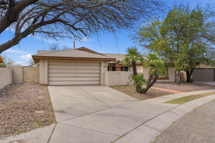 Shows beautifully! Well-maintained home featuring a 3 bedroom plus large den split bedroom floor plan with spacious living areas and great natural light. The kitchen opens to the main living space, creating a comfortable layout for everyday living and entertaining. The backyard is designed for Arizona living with a large covered patio with ceiling fans, built-in BBQ, brick paver patio, and built-in hot tub perfect for relaxing or hosting gatherings. The property also features a private front courtyard, 6-foot block wall for privacy, mature landscaping, and storage shed that conveys. Mini-split systems in every room provide efficient comfort year-round and help keep energy costs down.