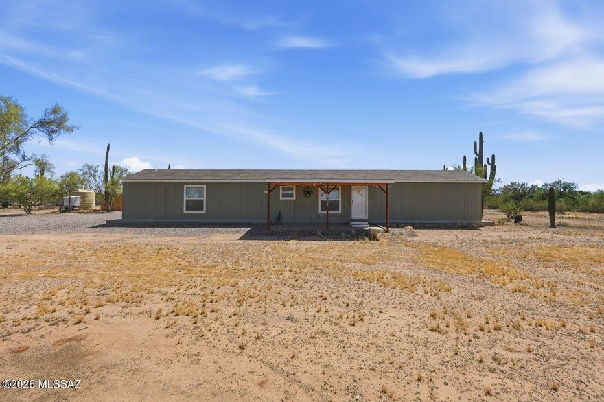 Enjoy peaceful desert living on 3.33 acres with breathtaking mountain views, open skies, and room to truly spread out. This 2024 Cavco 16x72 manufactured home offers 1,152 sq ft with 3 bedrooms and 2 bathrooms, combining modern comfort with a functional layout. The spacious kitchen features a large pantry for added storage, and the primary suite includes a generously sized closet. Step outside and take advantage of RV hookups, wide open space for animals, trailers, and all your recreational toys. Whether you're looking for privacy, room to roam, or a quiet retreat to enjoy desert sunsets and starry nights, this property delivers the best of rural living. This is HOME!