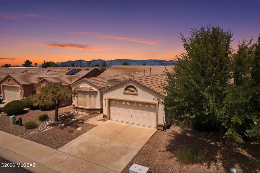 Welcome to this fully furnished 1-Owner home in the sought-after ''Voyager'' 55+, gated, community. This meticulously maintained home was the ''model'' & offers a rare floor plan with kitchen and dining at the front of the house, benefitting from natural light, just off the foyer. With 2 spacious BRs and 2 full BAs there is extra space in the living areas, perfect for family or for entertaining by the rare fireplace. Most systems have been updated in recent years: newer roof, HVAC, H2O heater, soft H2O conditioner, and appliances. Only 1 owner has occupied this home & has lovingly cared for every aspect. The 2-car garage has floor to ceiling built-in cabinets, and lots of room for tools and storage. Furnishings convey! A turnkey opportunity for the next owner of this very special property!
