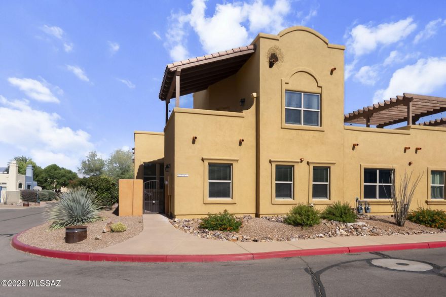 Welcome to easy living in the charming community of Barrio Embarcadero at Tubac. This beautifully maintained corner unit townhome offers the perfect blend of comfort, convenience, and low maintenance living. Ideal for seasonal residents or those ready to enjoy a more relaxed pace year round. Built in 2020 and lightly lived in, this 3 bedroom, 2 bath home feels practically brand new. With 1,563 square feet of thoughtfully designed space, you'll appreciate the bright, airy feel created by abundant natural light and an open-concept living and dining area. A cozy gas fireplace adds warmth and charm perfect for cool desert evenings. The spacious kitchen is both stylish and functional, featuring granite countertops, a large island with bar seating, stainless steel appliances, a pantry, and soft-close cabinetry. Each bedroom is generously sized, offering flexibility for guests, hobbies, or a home office. Upstairs, the private primary suite serves as a peaceful retreat, complete with a large walk-in closet, dual vanities, ample linen storage, and your own exterior balcony perfect for enjoying Arizona's beautiful sunrises and sunsets. The HOA enhances your lifestyle with access to a pool, hot tub, and recreational room great for socializing or unwinding. Conveniently located just minutes from local dining, golf course, pickleball courts, and everyday essentials, this home offers the best of both relaxation and accessibility. Whether you're seeking a seasonal getaway or a full time residence, this is truly a lock and leave property designed for comfort and ease.