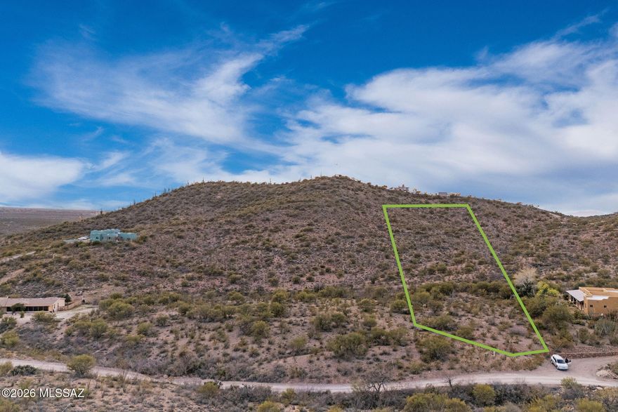 Discover the perfect canvas for your desert escape in the Rincon Mountains. This beautiful 4.49 acre lot offers a rare blend of privacy and potential, with ample space to build exactly what you envision. Featuring electricity and a shared well, the property is ready for building. Surrounded by natural beauty and open skies, you'll enjoy the peaceful setting that offers convenient access to nearby amenities, top-rated Vail School District schools, and major roadways. With no HOA, horse friendly zoning, and panoramic views, this land presents endless possibilities in a growing and desirable area.