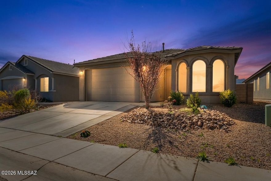 Modern Vibes. Mountain Views. Total Wow Factor. This better-than-new stunner in Summit Heights is everything you've been dreaming of with gorgeous mountain views & serious curb appeal. Step out back to your brand new, professionally designed backyard, fully landscaped & ready for year-round lounging, entertaining, & soaking in the AZ sunsets. It's like having an outdoor living room! Inside, it's all about sleek style & space. Four bedrooms, 2.5 baths, & an open-concept floor plan with chic, modern flooring & on-point neutral finishes that go with everything. The oversized kitchen is a total showstopper with tons of cabinets, expansive counters, & a layout that begs for dinner parties, game nights, or just making your morning coffee in style.  Come see it before it's gone! Serious new home feel!