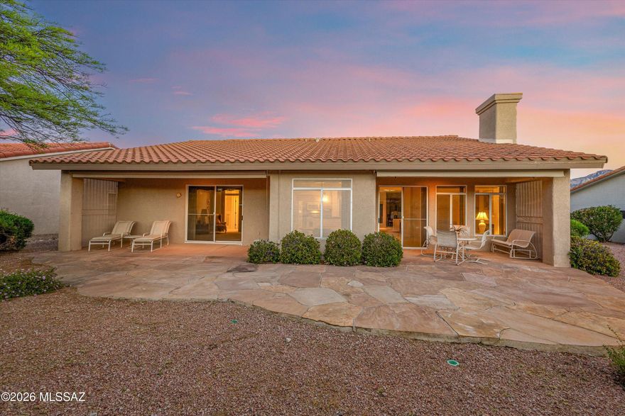 This one-owner home in the heart of Sun City Oro Valley has been wonderfully maintained! This 2-bed, 2-bath property features an expanded guest bedroom, along with dual back covered patios. Roof underlayment completely replaced in 2023. The primary suite has a walk-in tub,  large walk-in closet with built-in shelving, and a sliding door for private access to the second covered patio. The off-kitchen family room has a gas fireplace, and the kitchen has been updated with quartz countertops. The two-bay garage has built-in storage cabinets and an epoxy floor coating. Spend time golfing with friends and relaxing by the pool at this 55+ community with outstanding amenities and incredible mountain views.