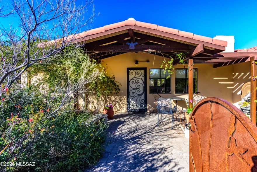 Gorgeous mid-century modern in Historic Catalina Vista neighborhood. 4  bedroom/3 ba with flowing floorplan. Great room w/fireplace & dining, kitchen w/new Corian counters, wine fridge and tons of cabinets. Split 4th bedroom, perfect guest space/office. Tile, polished concrete and cork floors, A/C new 2023, new appliances 2024. New 2 car garage built 2017, climate controlled. Front patio/yard is show-stopper with professionally designed mature native  Xeriscape landscaping, blooming desert plants and trees w/800 gal harvesting tank & irr system. Custom designed security doors and gates Enjoy the birds and butterflies in your own personal sanctuary. Perfect location near Banner Hospital and Univ of Ariz a cycle ride away. Tahoe Park is perfect for dogs and kids.