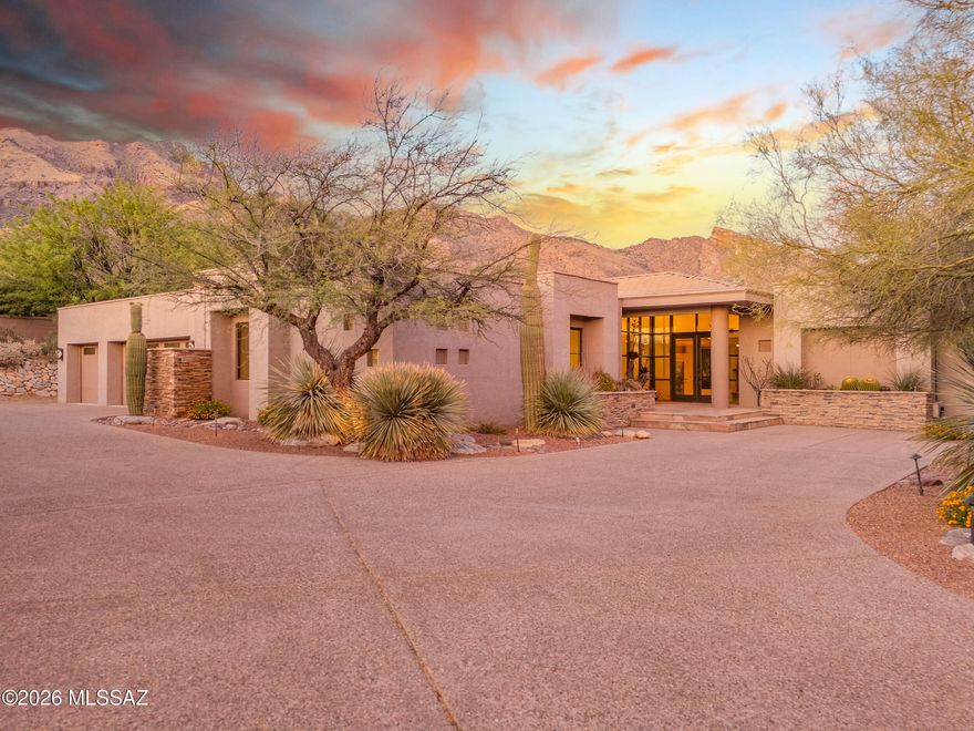 Tucked away at the end of a quiet cul-de-sac in the highly sought-after Cobblestone community, this exceptional 4-bedroom, 3.5-bath residence offers just under 4,000 square feet of thoughtfully designed living space on an expansive .86-acre lot. Located within a guard-gated neighborhood, the privacy here is truly unmatched--creating a serene retreat that still feels connected to everything Tucson has to offer.

Step inside to a well-executed split floorplan that balances comfort and functionality, with generously sized living areas that flow seamlessly for both everyday living and entertaining. Freshly updated with brand-new paint and carpet throughout, the home feels light, clean, and move-in ready. The kitchen presents a rare opportunity, a blank canvas ready to be transformed into your into your dream culinary space, tailored perfectly to your style and needs.

The northeast-facing backyard is where this home truly shines. Enjoy breathtaking mountain views complemented by subtle city light vistas, all from your private outdoor oasis. The pool and spa create a resort-style atmosphere, while a peaceful nature path just beyond your property invites you to unwind with a morning walk or evening sunset. A dedicated viewing bench offers the perfect spot to take in the surrounding wildlife and natural beauty.

Additional highlights include a spacious 3-car garage, central vacuum system, electric rolling shutter screens, and a soft water system. The home is also equipped with a 3-year-old leased solar system that significantly reduces monthly electric costs. The lease is transferable to the new owner and includes the added benefit of a 10-year roof warranty. For added peace of mind, the HVAC systems have been meticulously maintained with semi-annual servicing.

This property blends space, privacy, and potential in one of Tucson's most desirable gated communities--offering a lifestyle that feels both elevated and effortlessly livable.