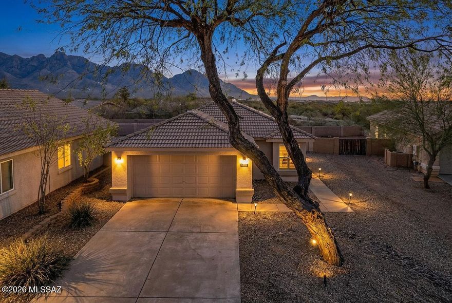 Beautifully maintained home with stunning mountain views from both the front and backyard. Major updates include a new HVAC system in 2019 with a 12-year full warranty on compressor, parts and labor. All windows were replaced in 2020 and feature plantation shutters throughout. The primary bath has been updated with a double-sink vanity, plus solar tubes add natural light in the kitchen and bath. Tile flooring runs throughout. Exterior was painted in 2022. Decorative security doors at the front and rear French doors complete this move-in ready home. This won't last long!