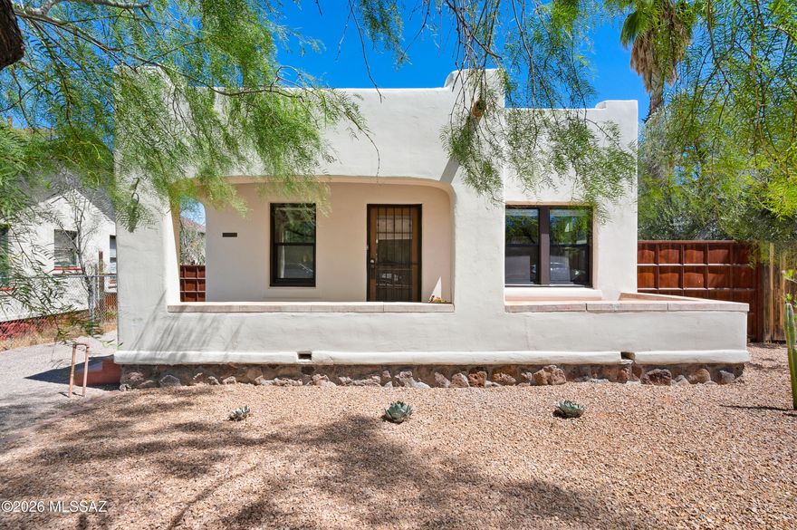 Charming 2-bedroom, 1-bath historic 1925 masonry bungalow in the desirable Feldman's District, just 0.5 miles from University Main Gate Square. This classic home blends timeless 1920s character with modern updates, including laundry room with washer/dryer, new roof, HVAC system, water heater, and new water and sewer lines. Situated on a quiet neighborhood street, this UArizona-area home also benefits from a historic tax credit, with annual property taxes of only $788. No HOA or CCRs. The low-maintenance 0.11-acre lot features off-street parking, double-gate backyard access, new pergola and shed. A rare opportunity in one of Tucson's sought-after historic neighborhoods.