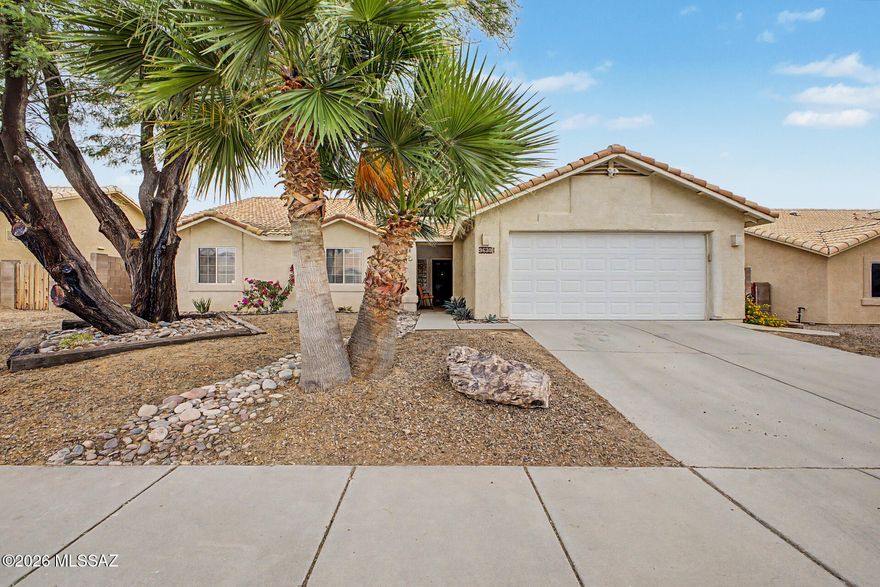 Welcome to your new home! This spacious 4-bed, 2-bath has an open & flexible layout, plus a new AC for peace of mind. The kitchen opens into a large living and dining space, plus you have separate formal living and dining rooms if you want a little extra space to spread out.  The primary bedroom offers a great layout, with a spacious walk-in closet and the additional bedrooms are well-sized with one featuring a charming loft area. 

The large, covered patio is perfect for entertaining, plus you're in the highly rated Vail School District and just minutes from Purple Heart Park, along with nearby shopping and dining.
