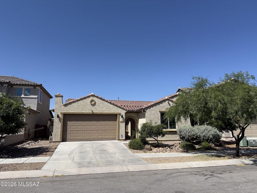 Looking for a large home with no rear neighbors? Look no further than this house that features a court yard entry, open split floor plan with a chefs delight kitchen, Espresso cabinetry w/crown molding. Double ovens, pull out shelves, upgraded range, large granite breakfast bar and island that opens to dining rm and great rm. Large walk in pantry too! 3 bedrooms and a den w/French doors. Large master with in-suite bath, linen closet, walk in closet, garden tub and shower and dual sinks. Hall bath has a linen closet and tub and 1/2 bath off of great room is a bonus. Back yard is stubbed for natural gas. This established newer community has a community pool, rec room, dog park an open spaces to enjoy throughout. All of this and on a cul-de-sac too! And Vail school district as well!