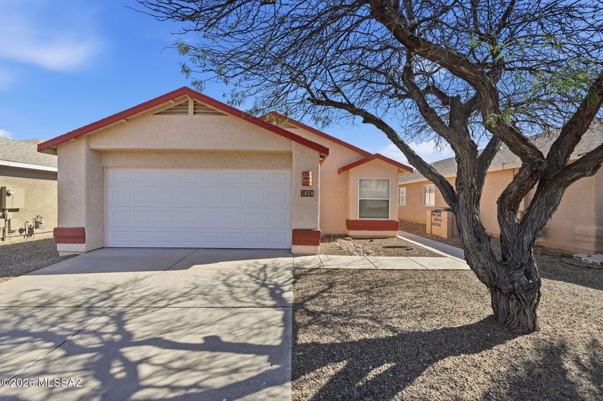 Charming 3 bedroom, 2 bathroom home in the desirable Rita Ranch area! This home features a split floor plan that offers privacy and comfortable living, with the primary suite separated from the secondary bedrooms. The open layout provides great space for everyday living and entertaining. Located in the highly sought-after Vail School District with no HOA, offering added flexibility and fewer restrictions. Conveniently situated near parks, shopping, dining, and everyday amenities. A great opportunity to own in one of the area's most popular communities!