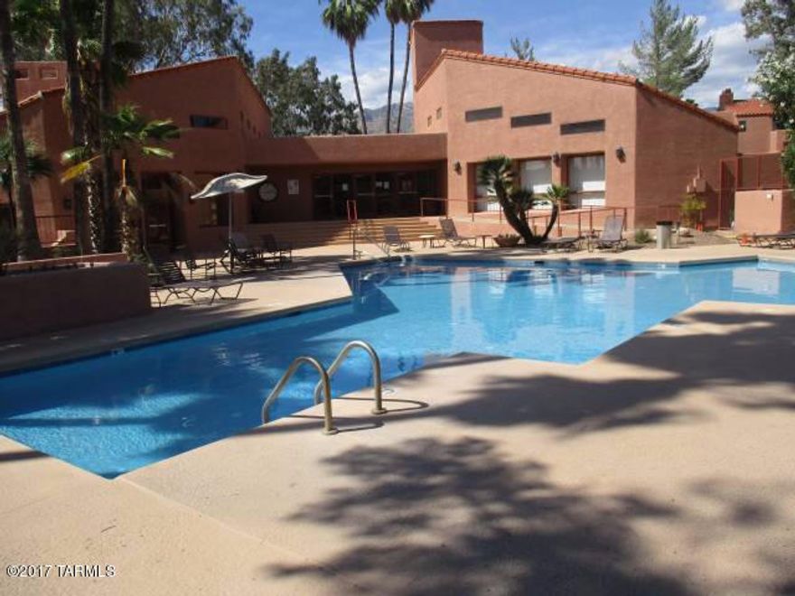 Just inside the gates of Ventana Vista you will find this second story unfurnished condo.  Only 4 units per building.  This bright & charming 1 bedroom unit will astound you.  Enjoy the natural light, cozy fire place & balcony with Mt. Views.  Efficient functional kitchen with lots of storage & matching stainless appliances.  Full Jack & Jill bath.  Laundry closet with washer & dryer.  Resort like grounds boast a heated salt water pool & 2 spas, tennis court, club house,exercise facilities billards, BBQ & mature landscaping.  All with short distance of Sabino Canyon, resorts, resturants & shopping