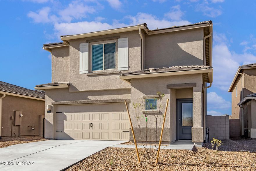 Two-story home with an open floor plan that boasts 4 bedrooms and 2.5 baths located in Star Valley. Features a spacious master suite with a generous walk-in closet, an upstairs tech area, a convenient laundry room, three additional roomy bedrooms, and a second full bath with dual bathtub and shower. Offers an array of upgrades, including energy-efficient kitchen appliances, front yard landscaping, and an attached two-car garage. The heart of this home is the chef-ready kitchen that showcases beautiful quartz countertops, wood cabinetry with crown molding, and recessed lighting, making it the stunning centerpiece of the home. 
The master bedroom easily accommodates king-sized furniture & features an incredible attached master bathroom and a walk-in closet, offering a personal sanctuary.